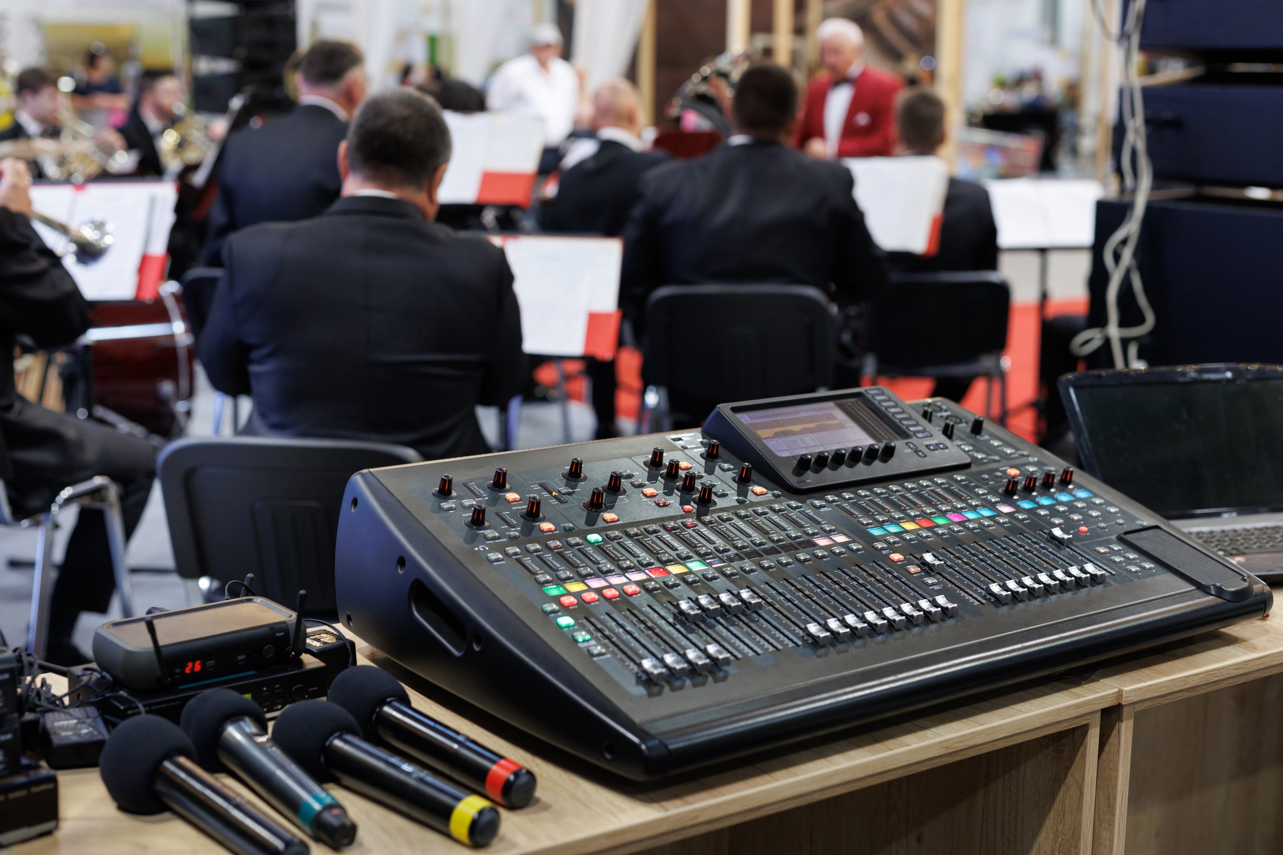 professional concert mixing console and microphones at the conference.